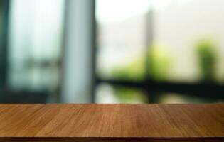 Empty wood table top and blur of out door garden background Empty wooden table space for text marketing promotion. blank wood table copy space for background photo