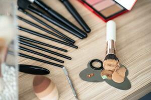 Decorative cosmetics makeup set on wood table. Set of luxury makeup product background photo