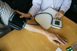 Doctor checking  patient arterial blood pressure. Health care photo