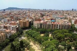 Aerial view of beautiful city Barcelona in sunny summer weather. photo