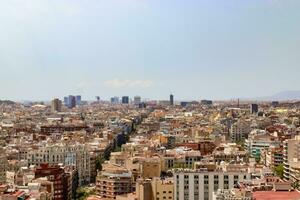 Aerial view of beautiful city Barcelona in sunny summer weather. photo