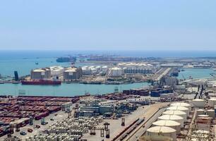 Aerial View of the industrial port of Barcelona on a sunny summer day. photo