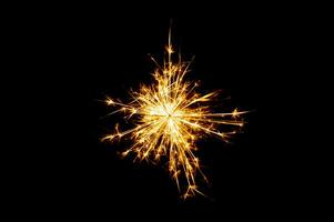 Fireworks, sparks, isolates on black background photo