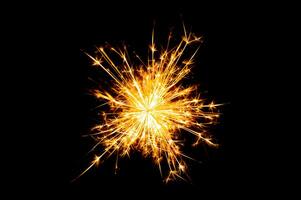 Fireworks, sparks, isolates on black background photo