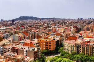 Aerial view of beautiful city Barcelona in sunny summer weather. photo