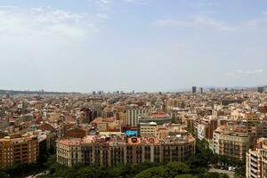 Aerial view of beautiful city Barcelona in sunny summer weather. photo