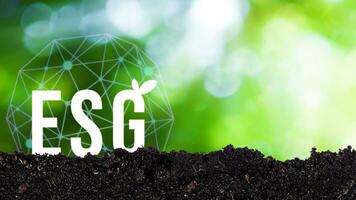 ESG icon concept for environmental, social and governance in sustainable and ethical business on the network connection on green background. photo