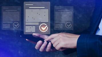 Paperless workplace idea, e-signing, electronic signature, document management system DMS. Businessman signs an electronic document on a digital document on a virtual screen. photo