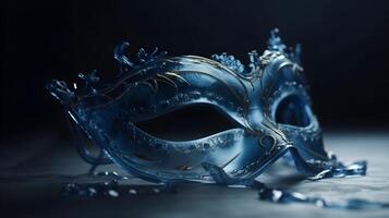 A blue half face semi transparent carnival mask festival high detail beautiful with dark studio background for concept and commercial used. photo