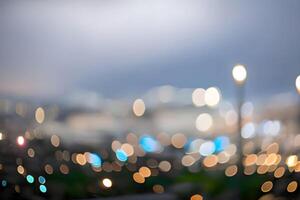 Blur or bokeh abstract lot of lighting at night background. Out of focus dreamy busy night life effect. photo