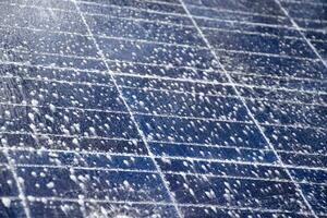 Front and upper surface of photovoltaic or solar cell panel which washing by water and soap to save and use it for a long time, soft and selective focus. photo