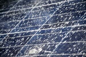 Front and upper surface of photovoltaic or solar cell panel which washing by water and soap to save and use it for a long time, soft and selective focus. photo