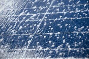 Front and upper surface of photovoltaic or solar cell panel which washing by water and soap to save and use it for a long time, soft and selective focus. photo