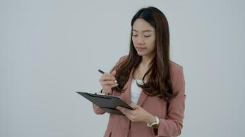 working woman, smiling Asia girl in work clothes note, freelance, out site, research, copy space, happy cheerful cute business, positive energy, Business plan, female executive, work from home video
