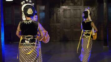 a group of Balinese dancers show their dancing skills on stage video