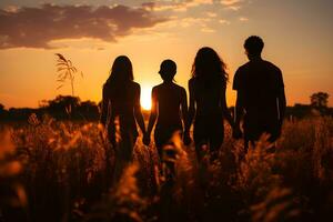 silhouette of friendship holding hands against the background of a meadow at sunset ,generative ai photo