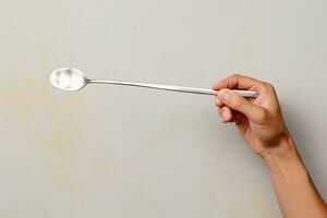 AI Generated Image of Hand Holding Spoon on Colorful Minimalism Background. photo