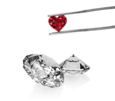 Excellent red heart cut diamonds held by tweezers and dazzling diamond, transparent background png