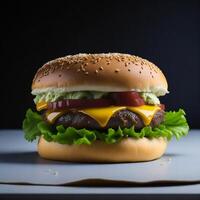 hamburger and fries on a wooden cutting board photo