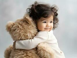 Cute little girl and her toy teddy bear. Friendship, best friend concept. photo