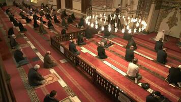 Bursa, Turkey, 2023 - Crowd of Muslim people praying in Bursa Grand Ulu Mosque. video