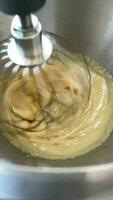Video of kneading yellow rich sweet dough for making delicious pastries at home