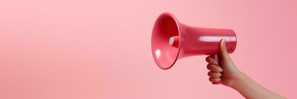 Generative AI, megaphone in hand on a empty pink background, panoramic image with copy space photo