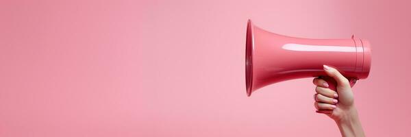 Generative AI, megaphone in hand on a empty pink background, panoramic image with copy space photo