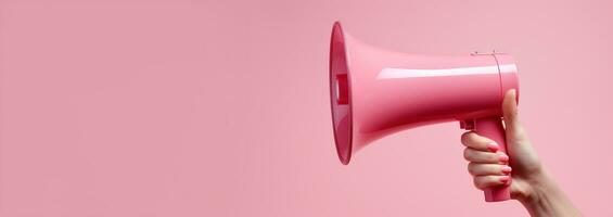 Generative AI, megaphone in hand on a empty pink background, panoramic image with copy space photo