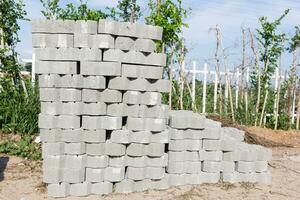 a pile of cement blocks photo