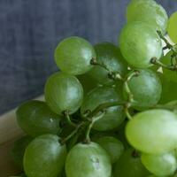 Bunches of green ripe grapes from a near angle. Still Life high definition photography photo