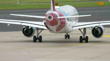 DUSSELDORF, GERMANY JULY 23, 2017 - Eurowings Airbus A320 D AEWK taxiing along the taxiway to the starting position before departure. Dusseldorf Airport DUS video