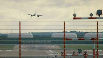 Airliner approaching landing, view of the taxiway of Dusseldorf airport video