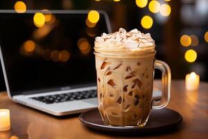 Ice coffee in a tall glass with cream. Cold summer drink coffee and working with laptop on wooden table at cafe. Illustration. photo