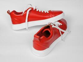 New Red leather sneakers with white soles photo
