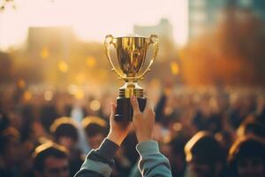 Business leader with winning cup photo