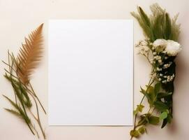 Empty paper with green leaves photo