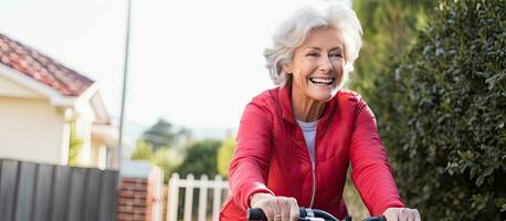 Which direction should I take Senior woman happily cycling alone in a suburban area photo