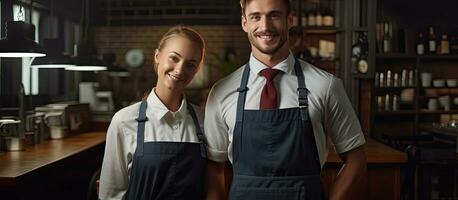 Two young waiters in aprons doing inventory in cafe copy space waist up photo