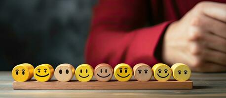 Customer selects smiley face and sad face icons on wooden cube symbolizing service rating and satisfaction Copy space available photo