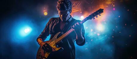 Man playing guitar at a club photo