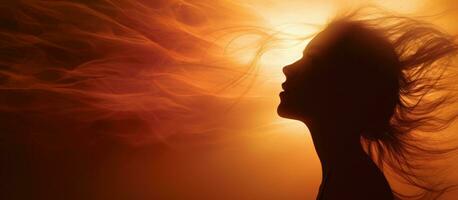 Silhouetted woman with sun in head multiple exposure photo