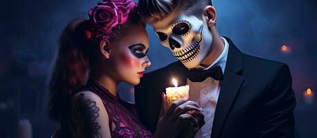 Costumes makeup and hairstyles are seen in a studio portrait of a young witch and a teenage boy holding a sign and skeleton for a Halloween celebration Th photo