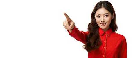 Asian woman wearing red outfit pointing up isolated white background photo