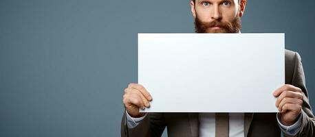 Man holding a blank placard to showcase your text or design photo