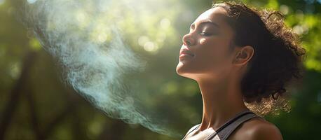 Backlit park with woman stretching profile view of upper body and copy space on right photo