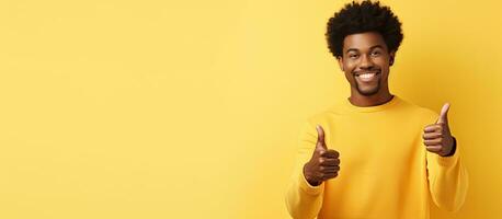Thumbs up from cheerful African American man recommending something photo