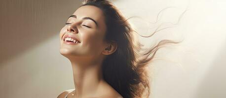 Young brunette experiencing happiness while getting beauty treatments at a hair salon vacant area photo