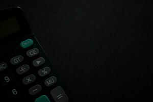 Financial concepts, calculators in dark tone for filling bright colored symbols photo