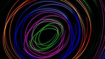 Multi color light painting photography, swirl and curve of blue, green and red light against a black background. photo